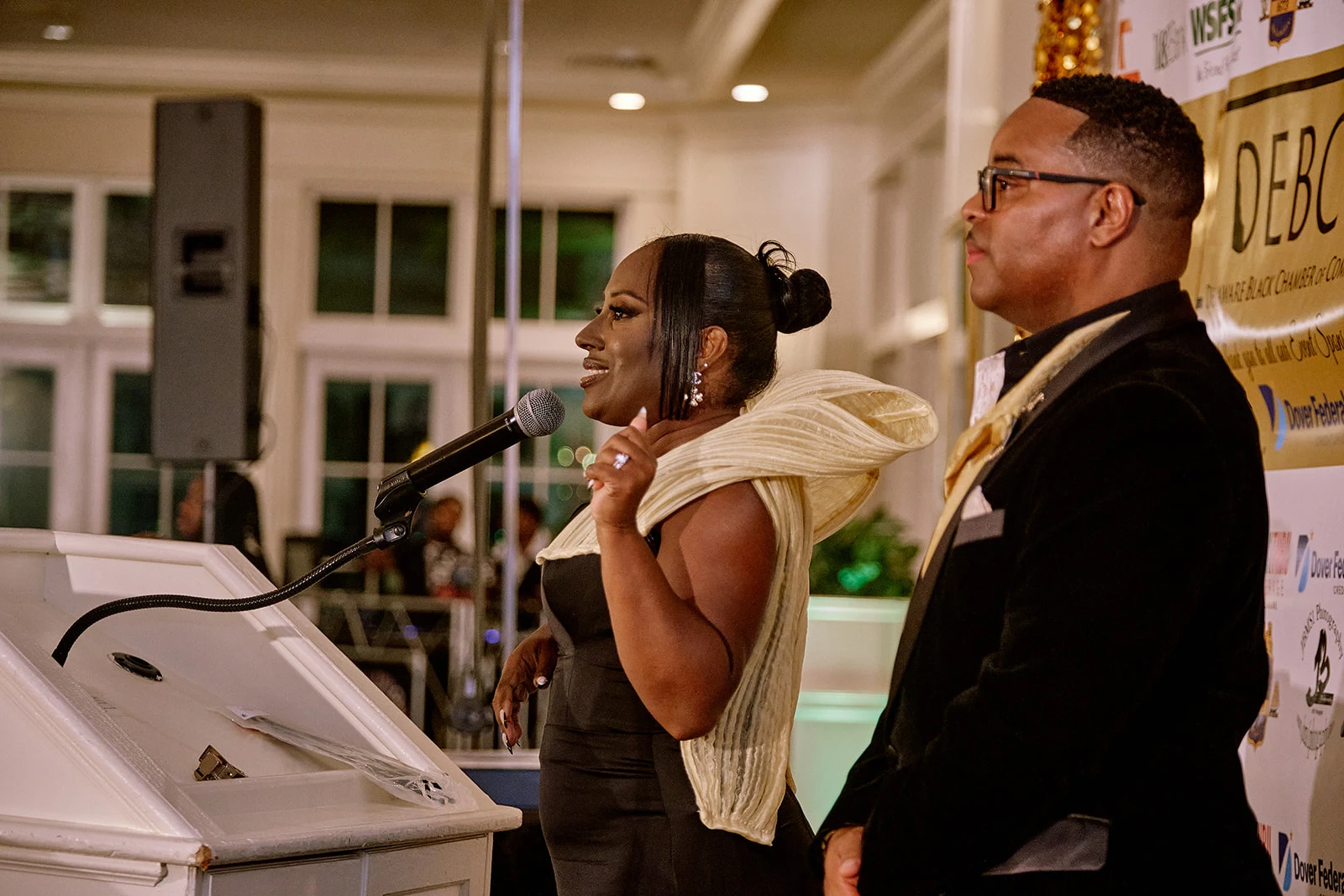A speaker talking at the DEBCC gala.