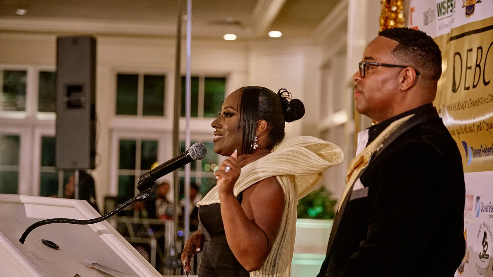 A speaker talking at the DEBCC gala.